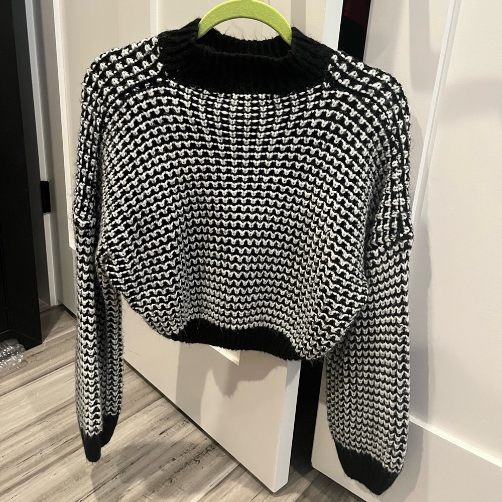 Cropped black and white crewneck sweater